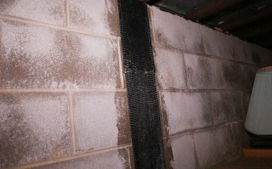 Closeup of installed carbon fiber basement repair