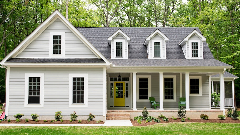  white and grey house with dormers