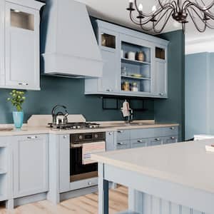 Modern kitchen with light blue cabinets and dark blue walls