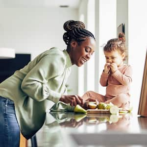 Mom and daughter eating a snack