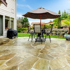 Slab concrete backyard patio table chairs