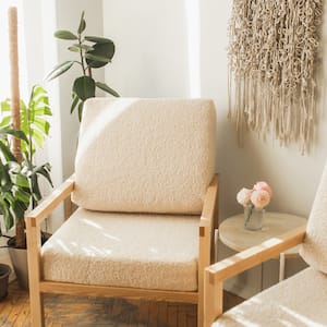 Two upholstered armchairs with fluffy fabric in a bright room