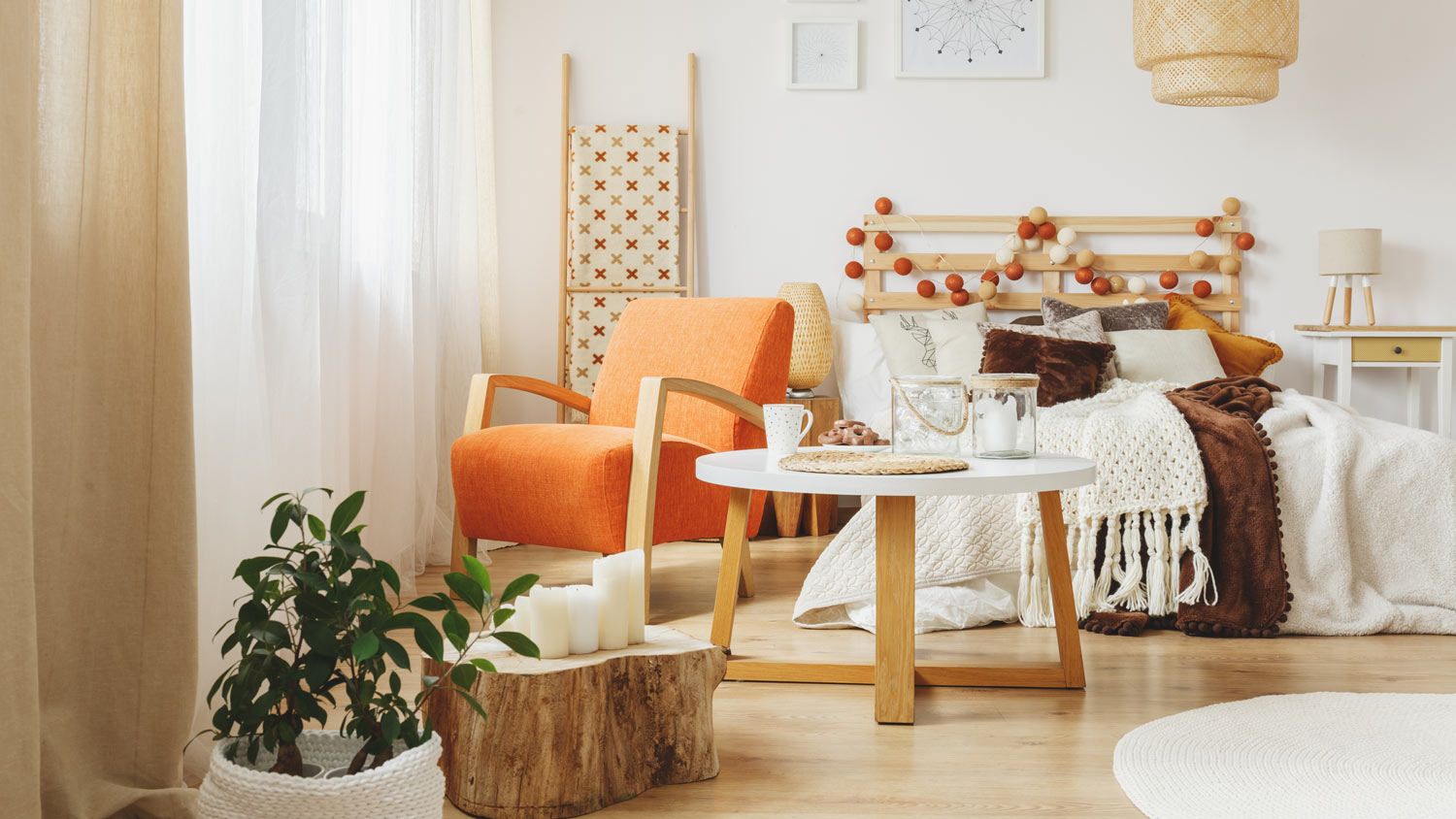 An orange wool armchair in a sunny bedroom