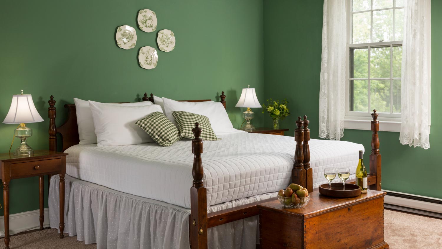 A bed in green bedroom