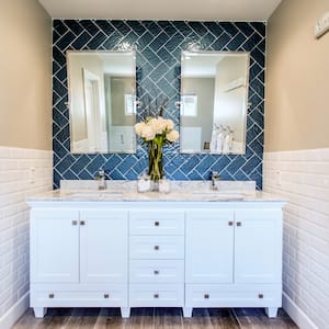 white shaker style bathroom cabinets in bathroom