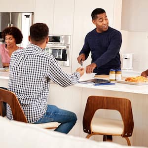 Family at kitchen island