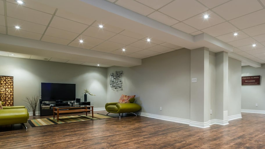 A basement with drop ceiling