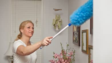 woman dusting