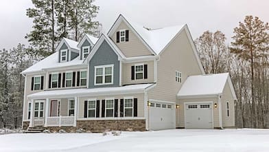 Big country house covered with snow