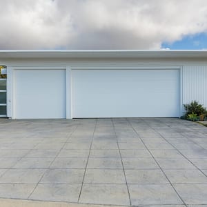 Concrete driveway for three car garage