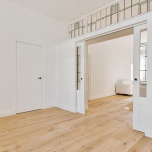 A pocket door in a spacious interior