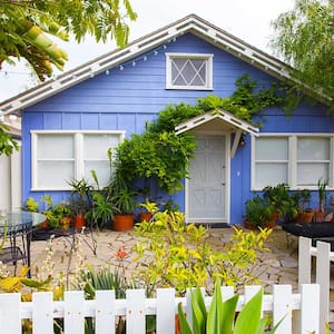 Exterior of a cottage painted blue