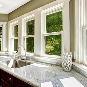 The interior of a kitchen with tinted windows