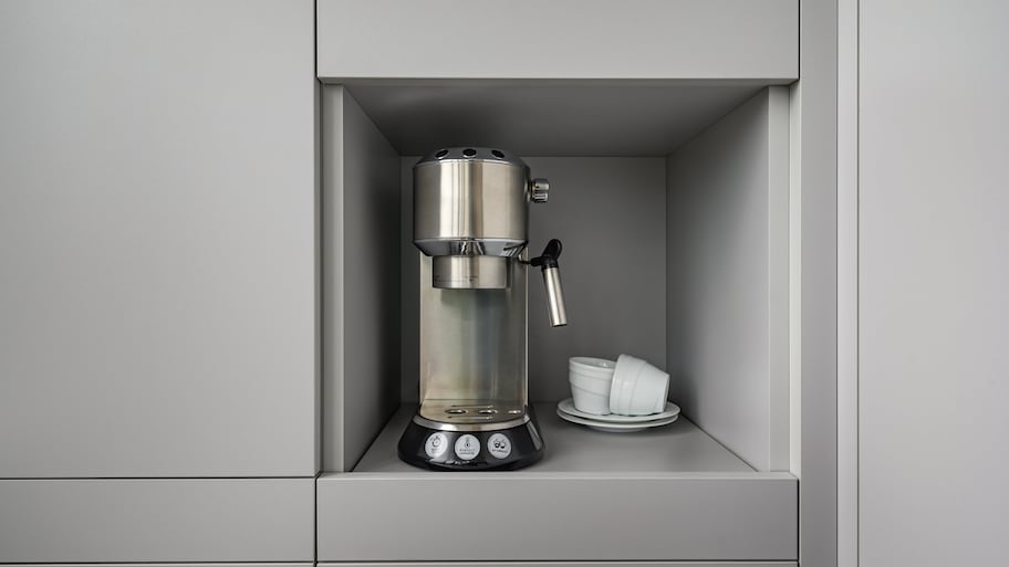 Modern gray cabinet with hidden espresso maker