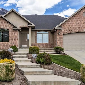 brick house with cement steps 