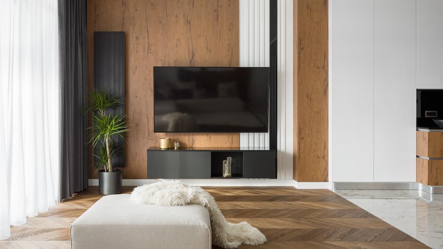 Living room with tv and open kitchen