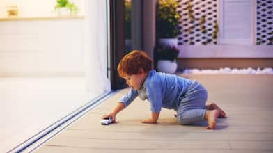 child playing on outdoor patio