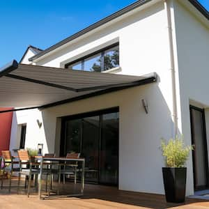 modern home backyard patio with awning