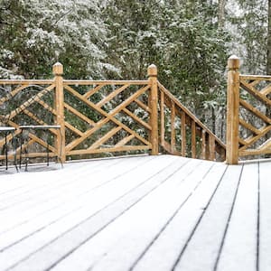 A wooden deck covered in snow