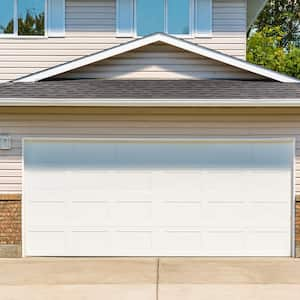 garage door with concrete driveway