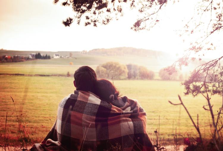 Couple enjoying the view together at sunset.