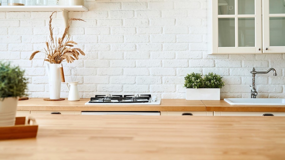 Modern minimal kitchen with wood countertops