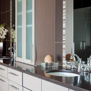 gray bathroom sink vanity with mirrors