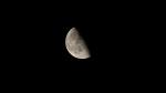 A Last Quarter Moon, also called Half Moon, where the left half of the Moon is lit up.