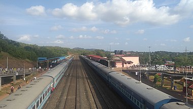 Trains await a crossing at the Thivim Railway Station in Goa, India. 3.jpg