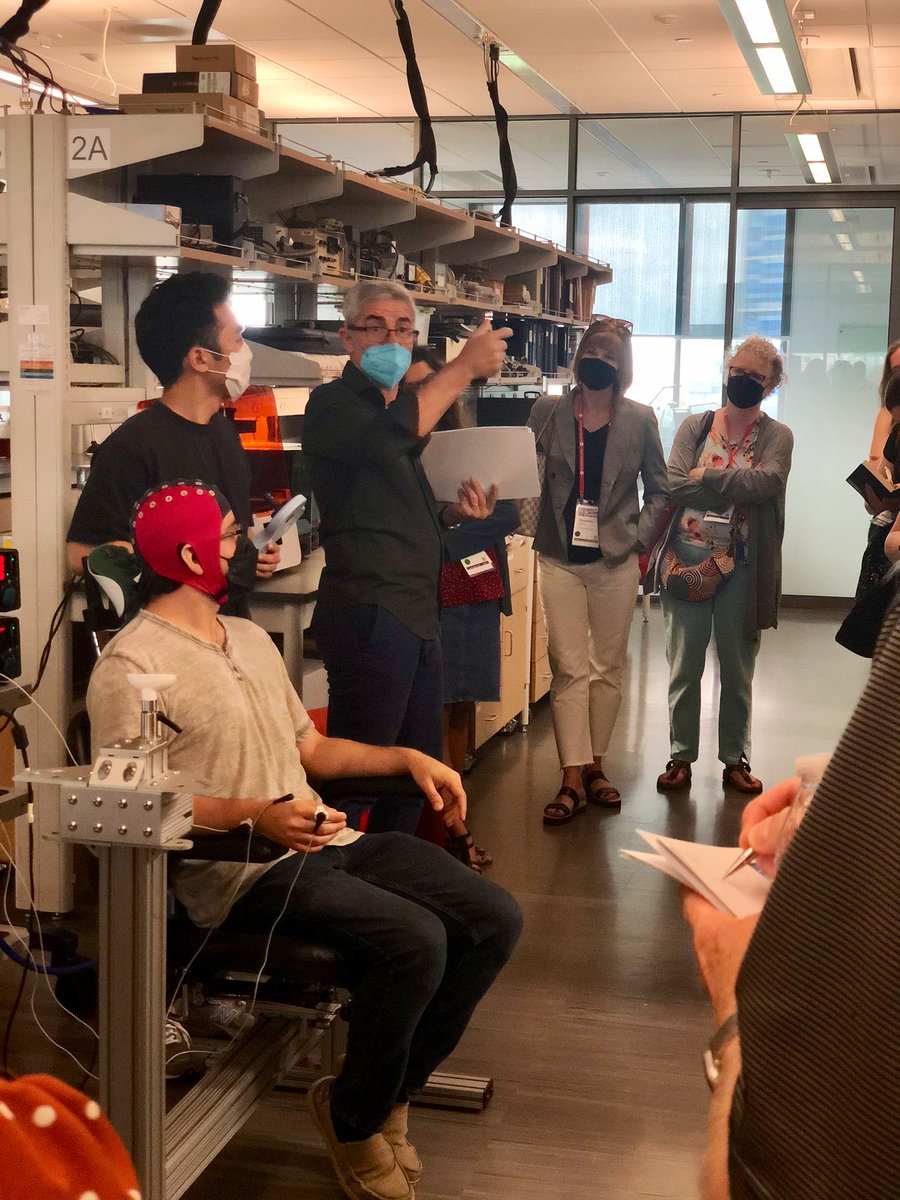 A researcher gives a demo of how electricity can be used to train brains and affect neuroplasticity to a room of journalists.