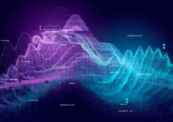 Image of big data analysis, with data represented in purple and light blue colored graphs, against a dark background.