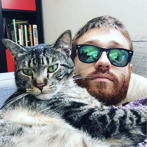 Guy with a handsome cat.