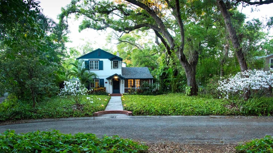 A house situated among oak trees