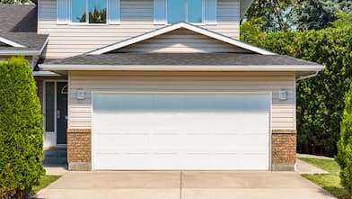 garage door with concrete driveway