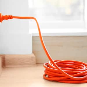 Orange extension into power outlet