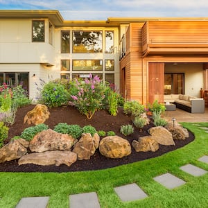 luxury home with beautiful landscape design