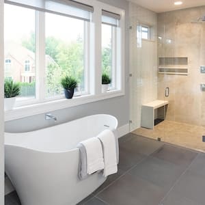 Modern bathroom with a deep, freestanding soaking tub 