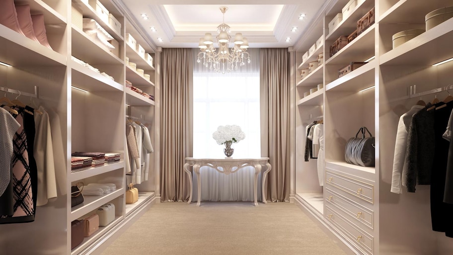 A beige luxury dressing room with a crystal chandelier