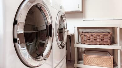 home washer and dryer with laundry baskets