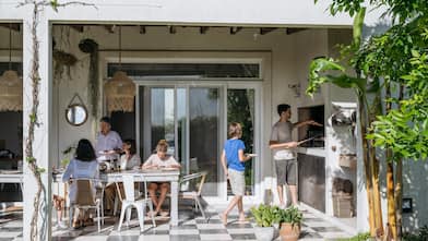 A family enjoying outdoor midday meal