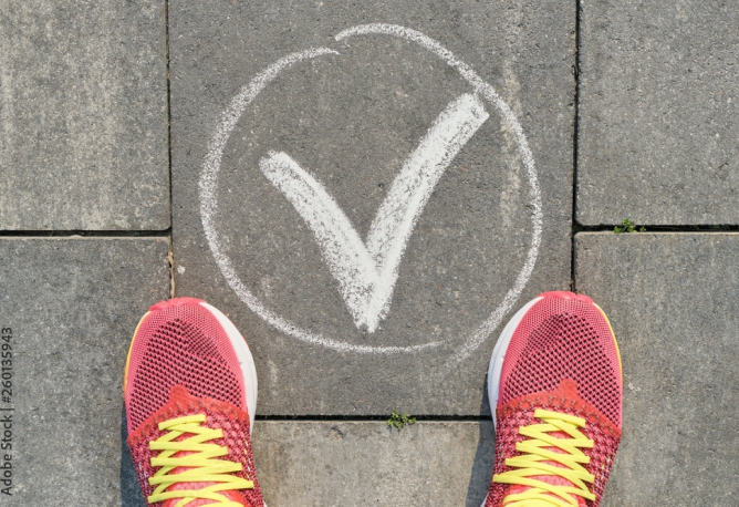 Checkmark in sidewalk chalk