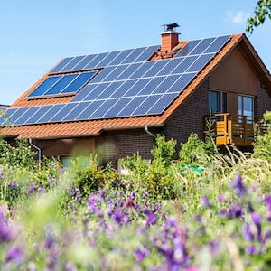 A house with solar panels during spring time
