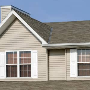 A house with beige vinyl siding