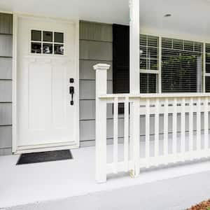 Front porch with white fence and concrete floor