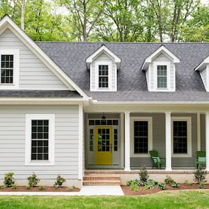  white and grey house with dormers