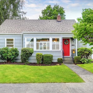 A cozy house with a red front door