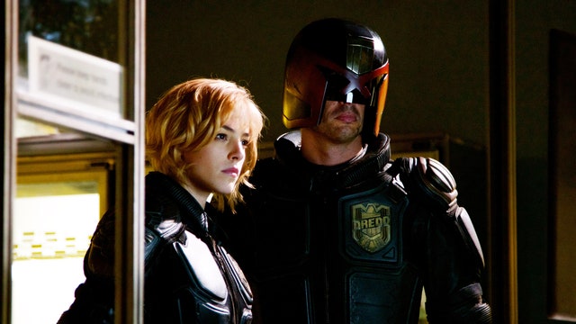 Olivia Thirlby and Karl Urban in film still from Dredd 2012