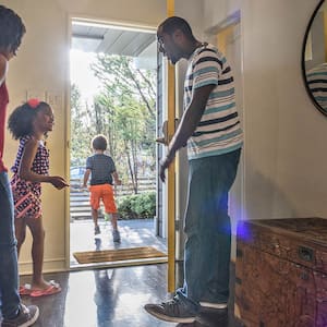 Family walking out of front door