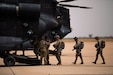 U.S. Army Paratroopers assigned to the Utah National Guard’s 19th Special Forces Group (Airborne) board a CH-47 Chinook flown by the 160th SOAR during a joint jump with the Utah National Guard’s 19th Special Forces Group (Airborne) and Royal Moroccan Army Paratroopers in Ben Guerir Air Base, Morocco, June 10, 2021. African Lion 2021 is U.S. Africa Command's largest, premier, joint, annual exercise hosted by Morocco, Tunisia, and Senegal, 7-18 June. More than 7,000 participants from nine nations and NATO train together with a focus on enhancing readiness for U.S. and partner nation forces. African Lion 21 is a multi-domain, multi-component, and multinational exercise, which employs a full array of mission capabilities with the goal to strengthen interoperability among participants. (U.S. Army photo by Spc. Rhianna Ballenger)