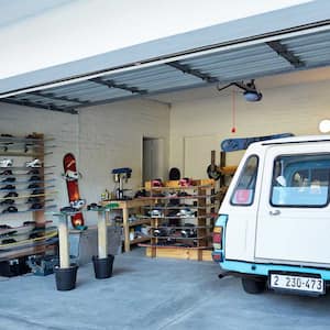  Garage and workshop with a van parked inside